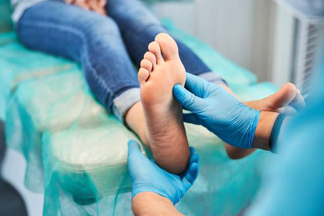 Foot exam by Podiatric Surgeon