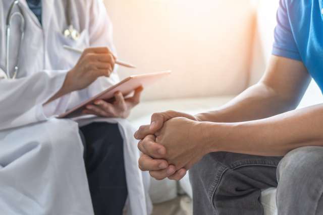 Psychiatrist working with patient