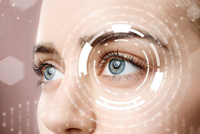 Young woman with iris scanning, closeup