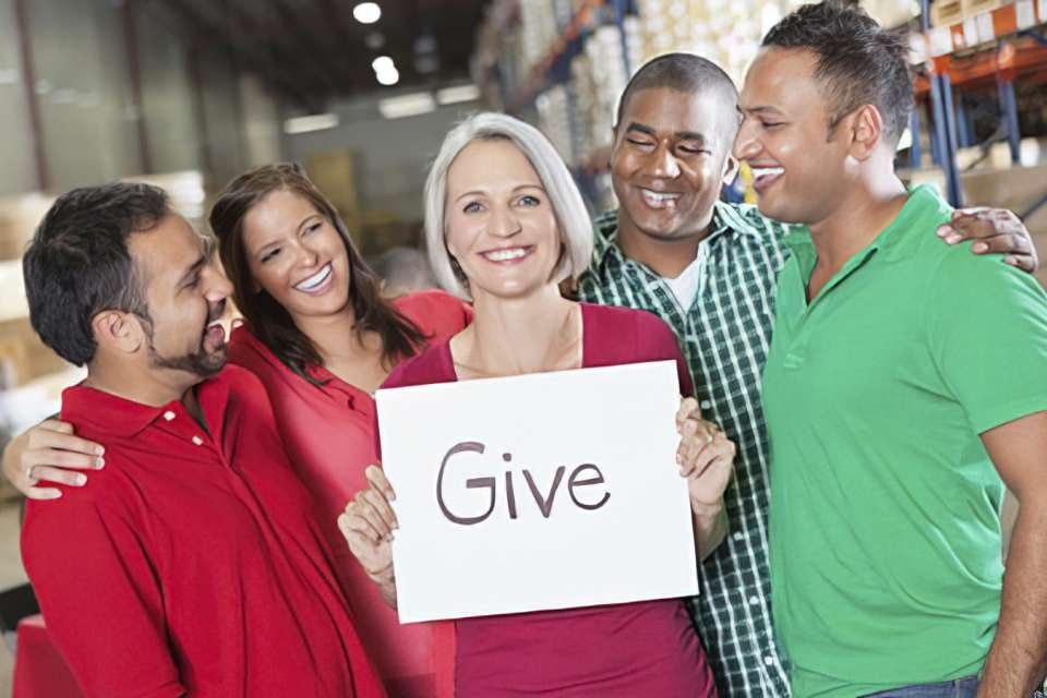 Workers joining together to support cancer research