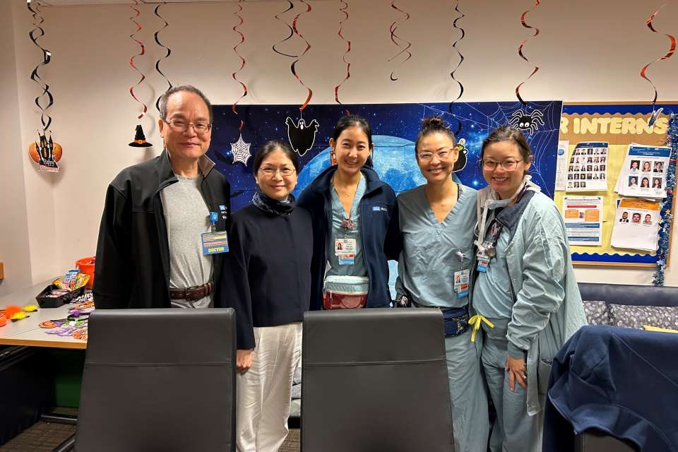 Dr. Yan with group and residents during rotation visit 