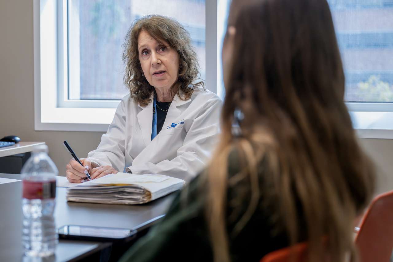Doctor speaking with patient