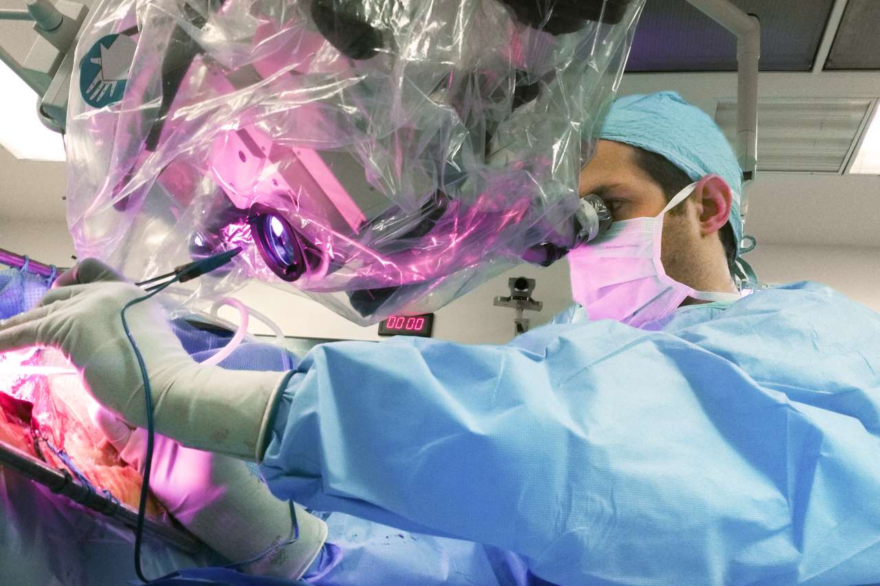 Richard Everson performing brain surgery