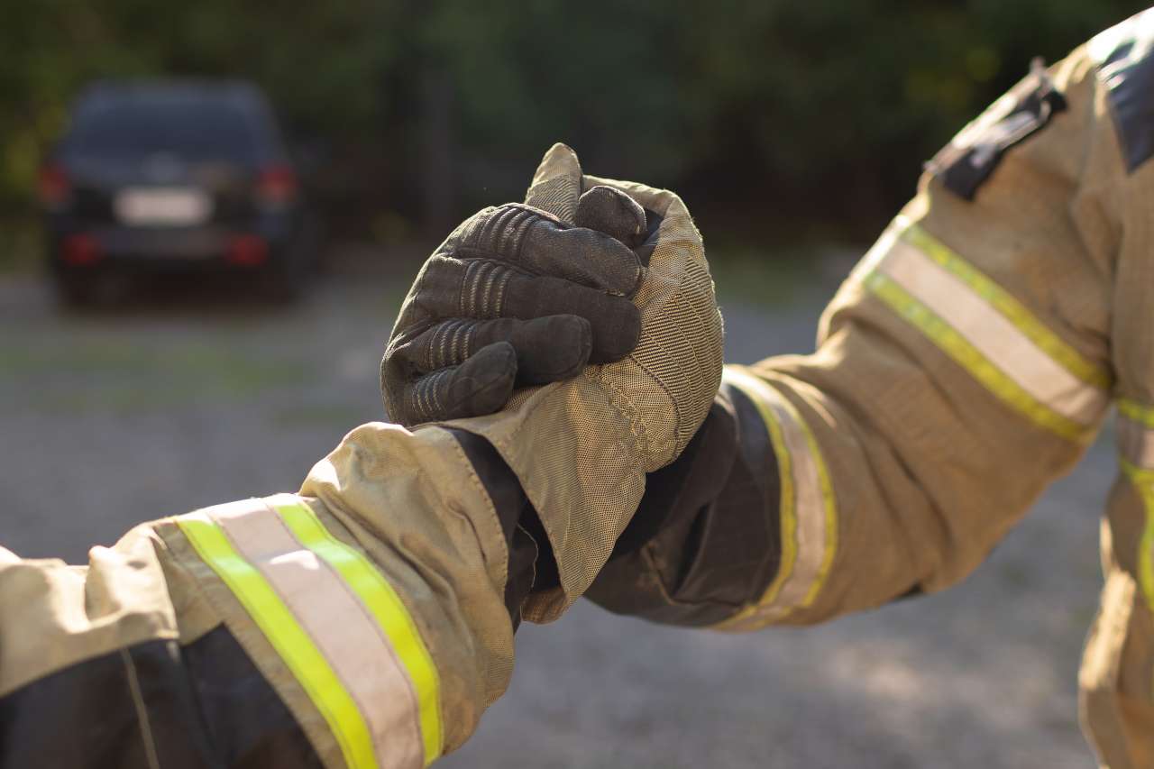 Los Angeles fireman shaking hands