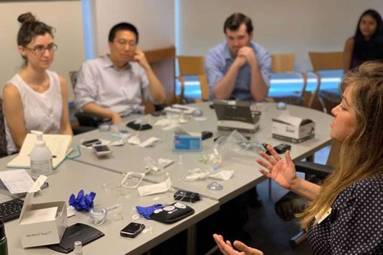 Fellows sitting at a table