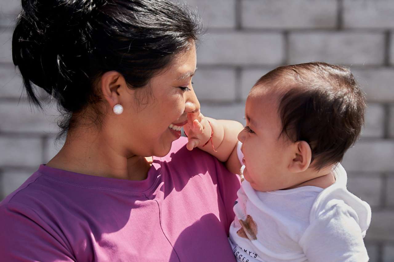 Woman holding child