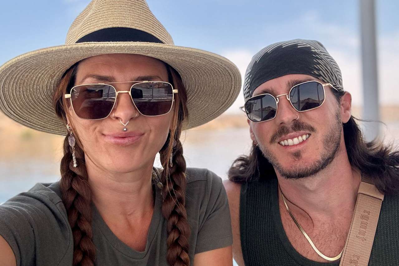 A woman and her brother pose during a trip to Egypt.