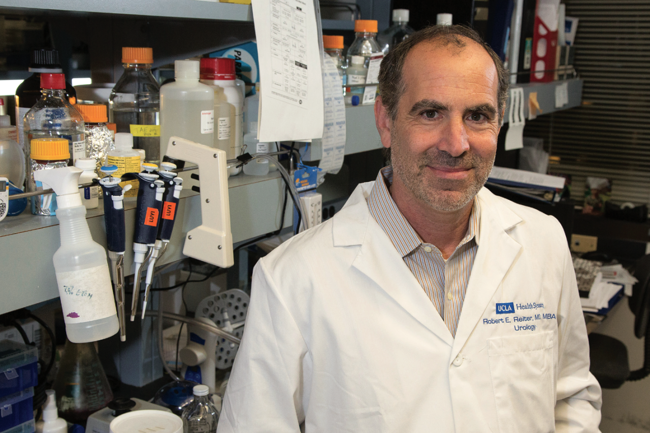 Dr. Robert Reiter, Principal Investigator of the UCLA SPORE in Prostate Cancer, standing in a laboratory setting with research equipment