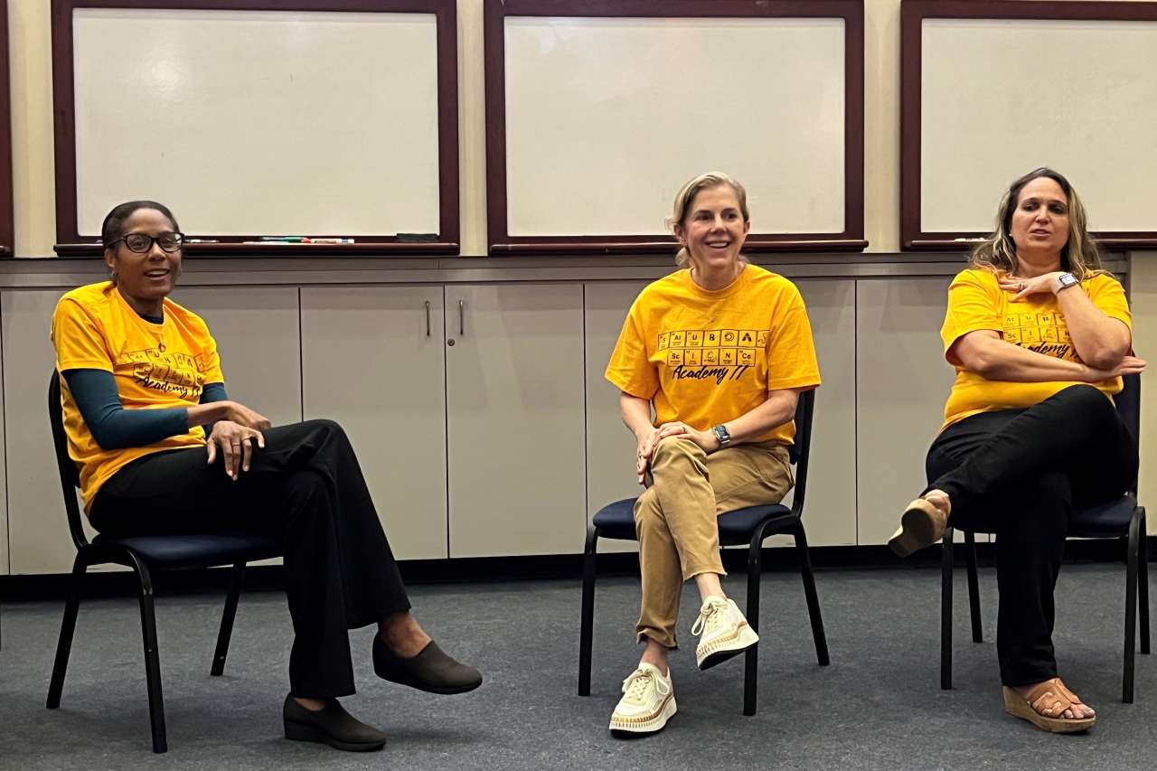 Drs. Karol Watson, Tamara Horwich, and Marcella Press speak with middle‑school students during a UCLA Health outreach event