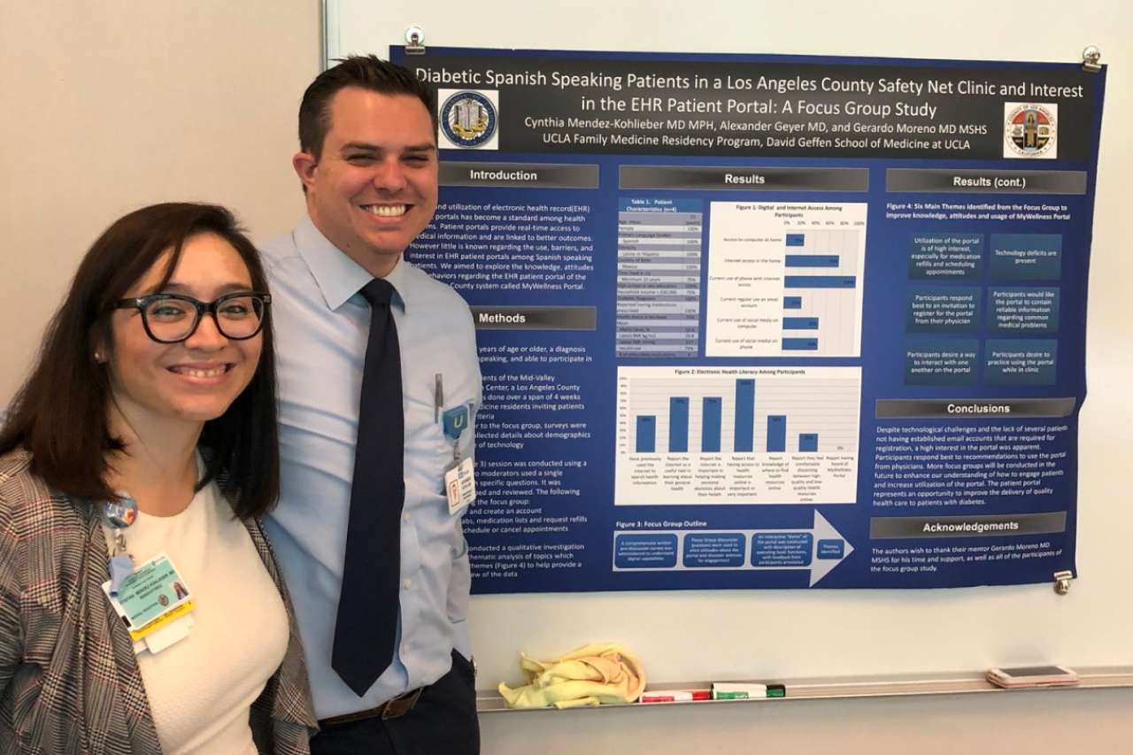 Students in front of a research poster on Spanish-speaking diabetic patients’ interest in an EHR portal at a Los Angeles safety-net clinic.