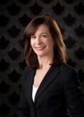 professional headshot of Janet Wells, who has brown hair
