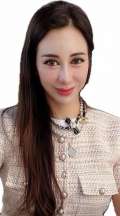 Headshot of Cindy Huang, who has brown hair