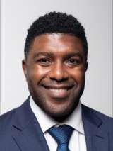 headshot of Michael Davis in blue suit