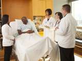 Doctors speaking to patient