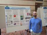 Matt Heffel stands in front of his display at Neurology Science Day 2024