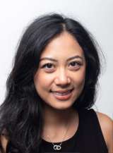 headshot of Grace Zhang in black shirt