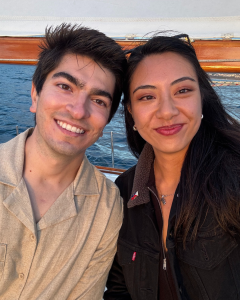 DAPM Resident Physician, Lori Laddaran, MD, and partner on a boat 