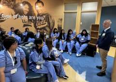 Turner-UCLA Allied Health students touring the UCLA Blood and Platelet Center in Ackerman Union with Tom King, Campus Blood Donor Recruiter