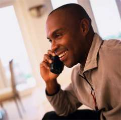 A man on the phone calling about giving a donation.