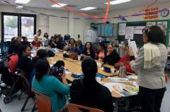 Students attending financial literacy and nutrition education program