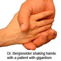 Doctor shaking patients hand