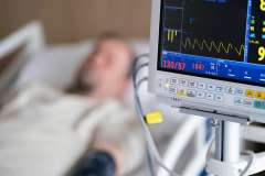 Man on hospital bed 