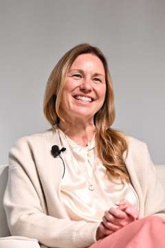 Dr. Amander Clark smiles during a UCLA panel event.