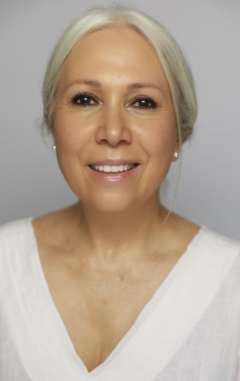 Headshot of Mitra Manesh