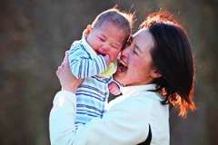 Woman holding her baby