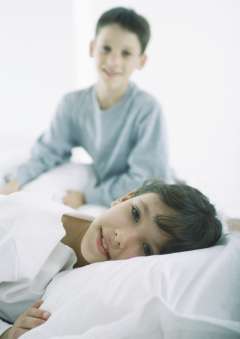 Siblings in hospital room