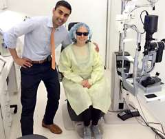 Dr. Al-Hashimi with LASIK patient after completing a successful surgery.