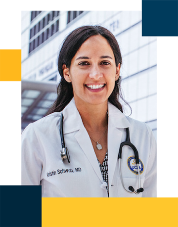 Dr. Kristin Jensen wearing a white lab coat with stethoscope around her neck standing outside of Ronald Reagan Medical Center.