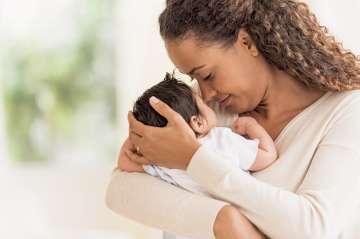 Woman holding newborn