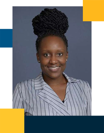 Iview Egiebor wearing a striped button down shirt and hair up in a bun