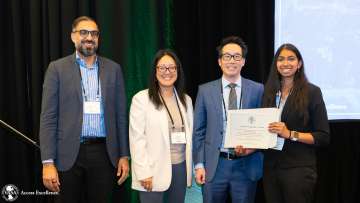 Mohamad Hussain, MD, PhD; Karen Woo, MD, PhD; Charles Kim, MD; Sahana Ravishankar. Drs. Hussain, Woo, and Kim present a certificate to Sahana Ravishankar for 3rd place podium presentation.