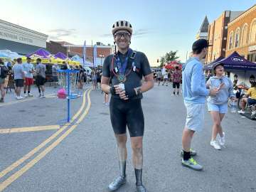Photo of DAPM Anesthsiologist Colby Tanner, MD after a bike ride