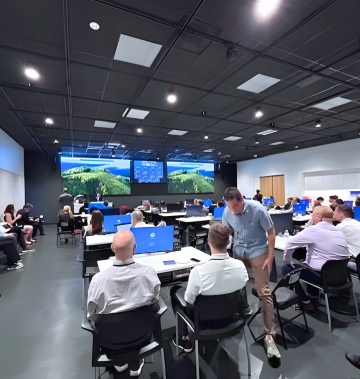 People watching presentation at the inaugural Wound Care Symposium