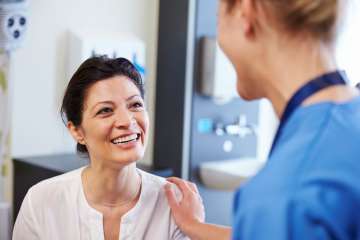 smiling patient with doctor