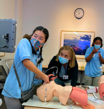 Student performs endoscopy on a mannequin simulator