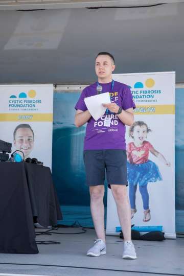 Cody Allarte speaks at an event