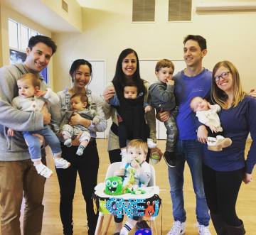 Residents holding their babies.