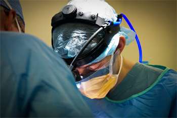 Close up of surgeon at operating table