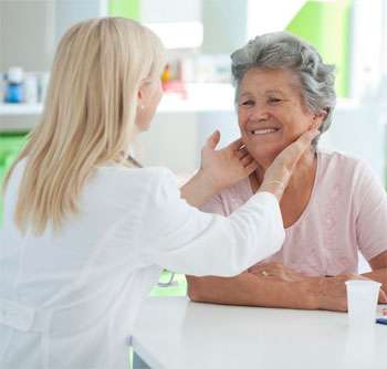 ENT Doctor checking patient