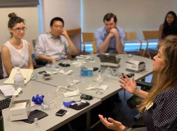 Fellows sitting at a table