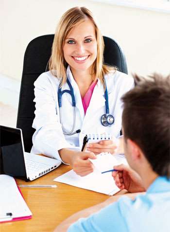 A doctor speaking with a donor