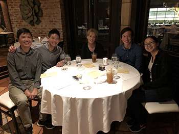 Fellows sitting at a table