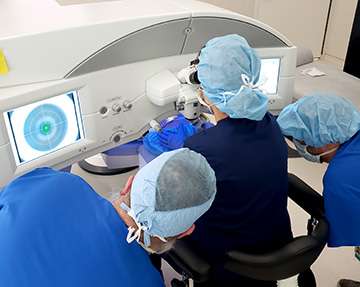 Dr. Nejad positions a patient to create a LASIK flap using the Zeiss VisuMax femtosecond laser.