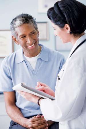 Man speaking to a doctor