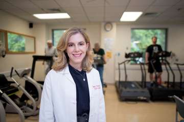 Doctor standing in gym