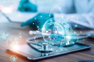 Research hologram hovering over stethoscope and tablet device